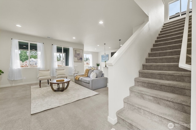 9018 Viola St SE, Tumwater, WA 98501 - living room featuring stairs, carpet floors, and recessed lighting
