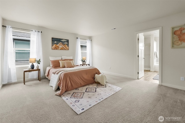 9018 Viola St SE, Tumwater, WA 98501 - carpeted bedroom with multiple windows and ensuite bath