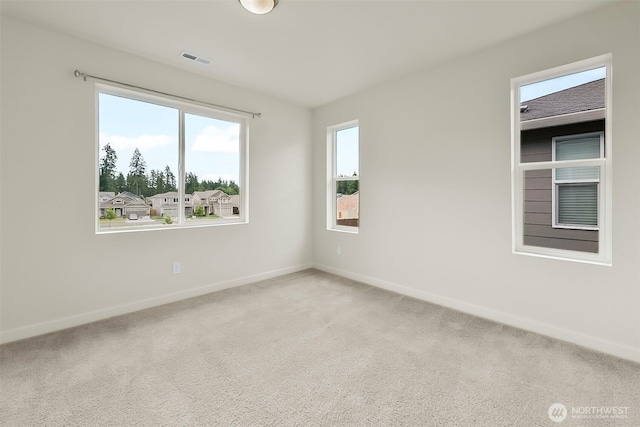 9018 Viola St SE, Tumwater, WA 98501 - carpeted spare room with baseboards