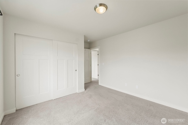 9018 Viola St SE, Tumwater, WA 98501 - unfurnished bedroom with light carpet and a closet