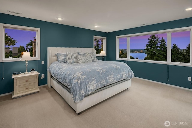 7761 Lakemont Dr NE, Seattle, WA 98115 - bedroom with light carpet and recessed lighting