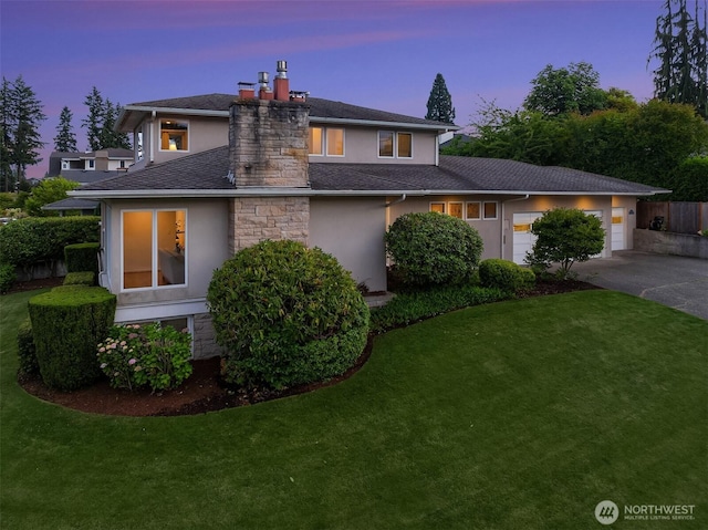 7761 Lakemont Dr NE, Seattle, WA 98115 - view of front facade featuring stucco siding, concrete driveway, a front yard, and a chimney