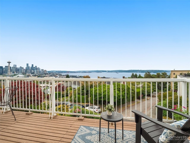 526 W Kinnear Pl, Seattle, WA 98119 - wooden terrace featuring a water view