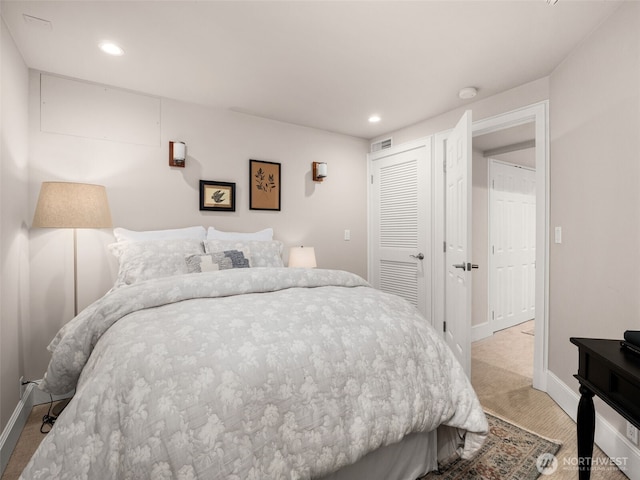 526 W Kinnear Pl, Seattle, WA 98119 - bedroom with recessed lighting, light colored carpet, and a closet
