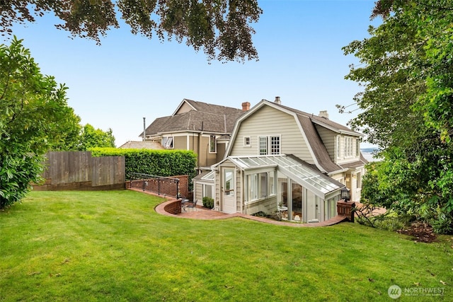 526 W Kinnear Pl, Seattle, WA 98119 - rear view of property featuring a gambrel roof and a chimney