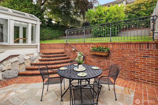 526 W Kinnear Pl, Seattle, WA 98119 - view of patio / terrace with outdoor dining area
