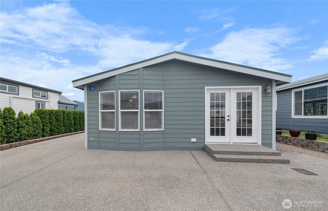 1000 State Route 150 Unit 18, Manson, WA 98831 - back of house featuring french doors and a patio