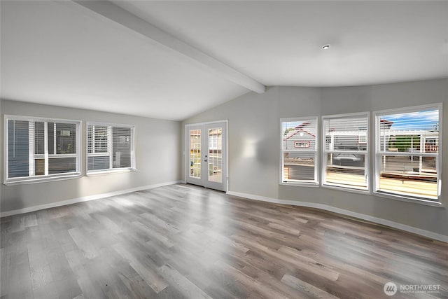 1000 State Route 150 Unit 18, Manson, WA 98831 - unfurnished living room with wood finished floors and french doors