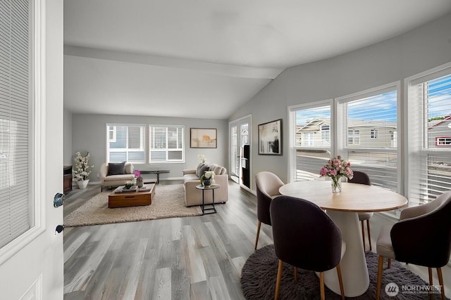 1000 State Route 150 Unit 18, Manson, WA 98831 - dining room featuring wood finished floors and vaulted ceiling