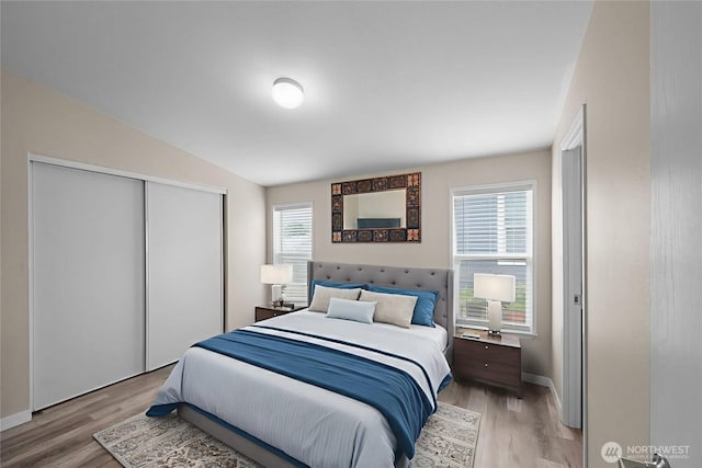 1000 State Route 150 Unit 18, Manson, WA 98831 - bedroom with a closet and light wood-type flooring