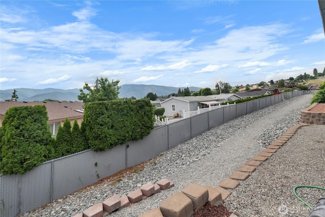 1000 State Route 150 Unit 18, Manson, WA 98831 - fenced backyard featuring a mountain view and a residential view