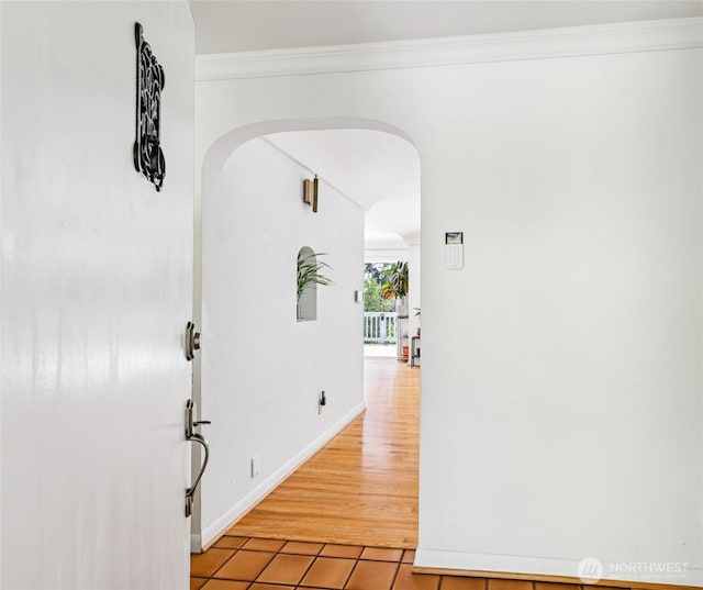 5325 Monta Vista Dr E, Edgewood, WA 98372 - corridor featuring arched walkways and light tile patterned floors