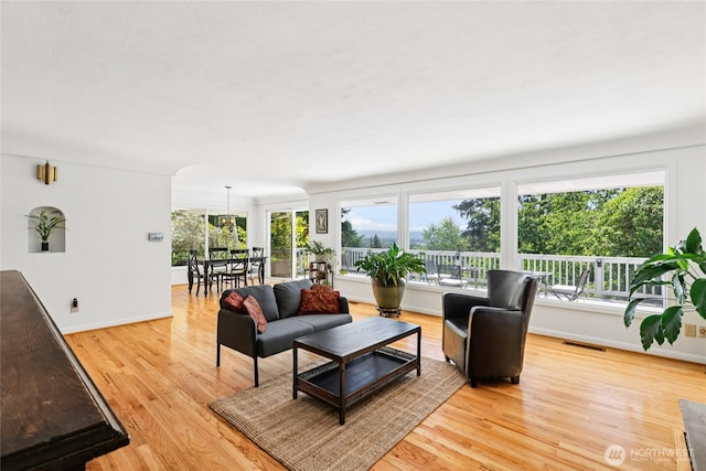 5325 Monta Vista Dr E, Edgewood, WA 98372 - living area featuring light wood-style floors and baseboards