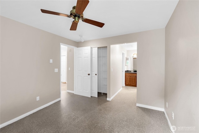 1628 118th Ave SE Unit F316, Bellevue, WA 98005 - unfurnished bedroom with ceiling fan, a closet, and ensuite bath