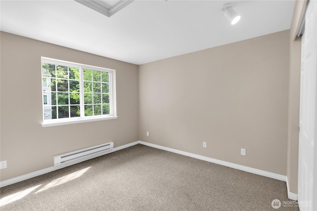 1628 118th Ave SE Unit F316, Bellevue, WA 98005 - carpeted spare room with a baseboard heating unit and baseboards