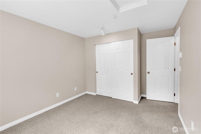 1628 118th Ave SE Unit F316, Bellevue, WA 98005 - unfurnished bedroom featuring carpet and a closet