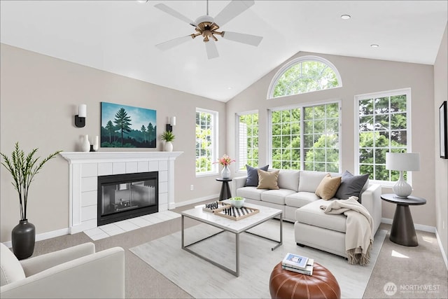 1628 118th Ave SE Unit F316, Bellevue, WA 98005 - living area with a ceiling fan, lofted ceiling, and a tiled fireplace