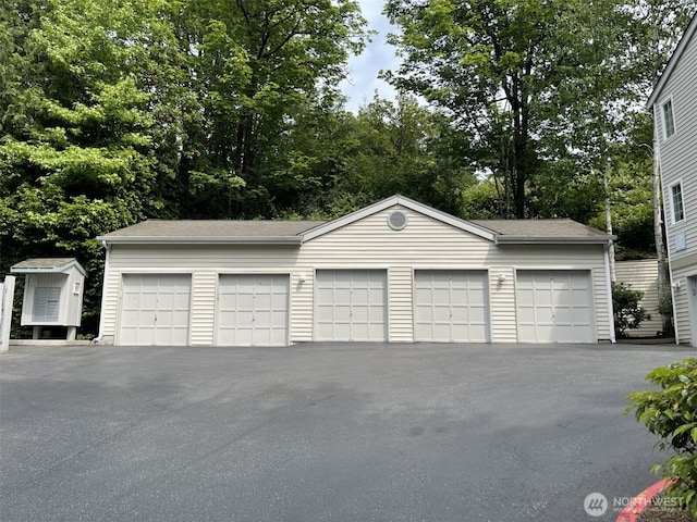 1628 118th Ave SE Unit F316, Bellevue, WA 98005 - garage with view of scattered trees