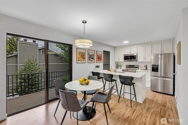 11701 100th Ave NE Unit 2, Kirkland, WA 98034 - dining area with plenty of natural light, light wood-style flooring, and recessed lighting