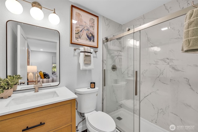 11701 100th Ave NE Unit 2, Kirkland, WA 98034 - ensuite bathroom featuring a marble finish shower and vanity