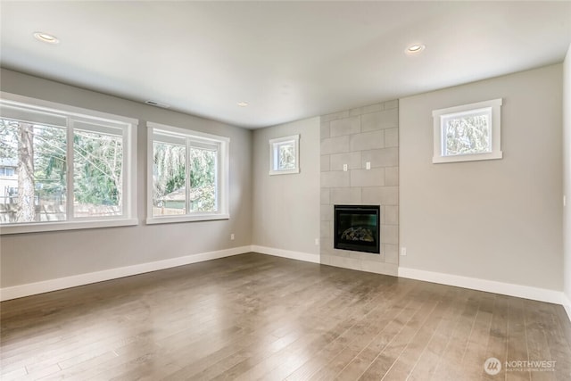 411 205th St SW Unit A, Lynnwood, WA 98036 - unfurnished living room featuring dark wood finished floors, a fireplace, and recessed lighting