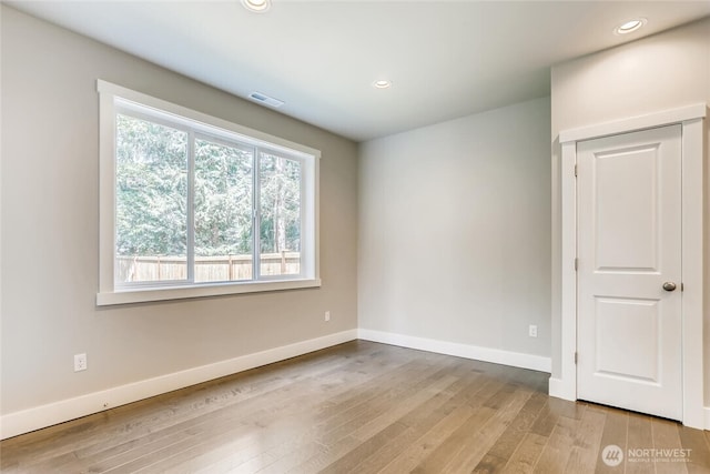 411 205th St SW Unit A, Lynnwood, WA 98036 - unfurnished room with wood finished floors and recessed lighting