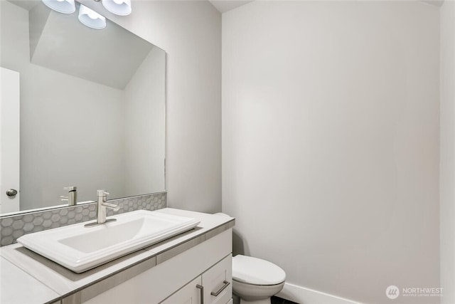 411 205th St SW Unit A, Lynnwood, WA 98036 - bathroom featuring vanity and decorative backsplash