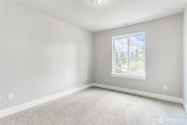411 205th St SW Unit A, Lynnwood, WA 98036 - spare room with baseboards and carpet