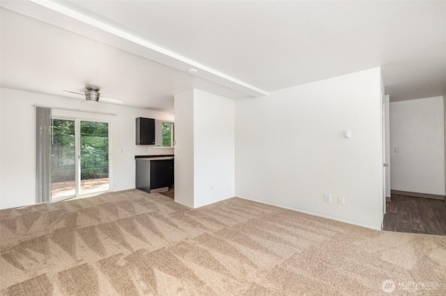 31308 107th Pl SE Unit B1, Auburn, WA 98092 - unfurnished living room featuring carpet floors and ceiling fan