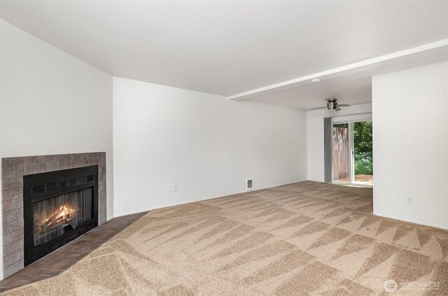 31308 107th Pl SE Unit B1, Auburn, WA 98092 - unfurnished living room with carpet, a fireplace, and a ceiling fan