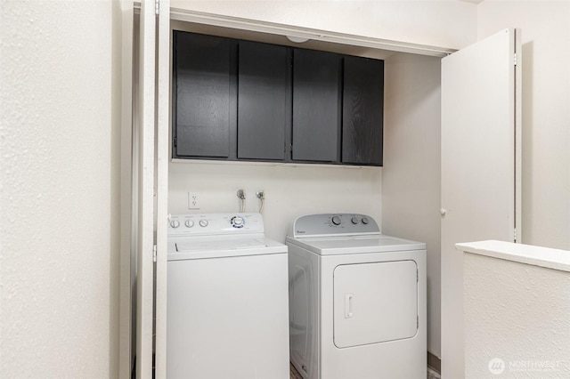 31308 107th Pl SE Unit B1, Auburn, WA 98092 - washroom featuring cabinet space and washing machine and dryer