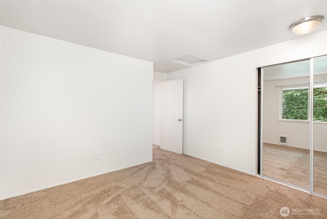 31308 107th Pl SE Unit B1, Auburn, WA 98092 - unfurnished bedroom with carpet, attic access, and a closet