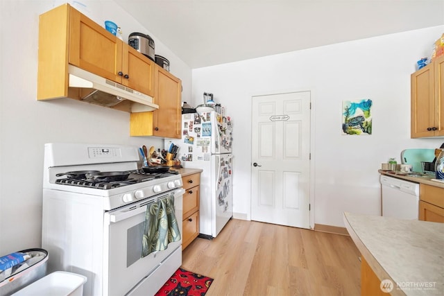 4020 Byron Ave, Bellingham, WA 98229 - kitchen featuring white appliances, under cabinet range hood, light wood finished floors, and light countertops