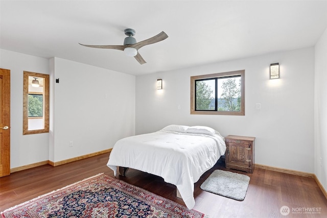 13402 Spring Site Rd E, Orting, WA 98360 - bedroom featuring wood finished floors and a ceiling fan