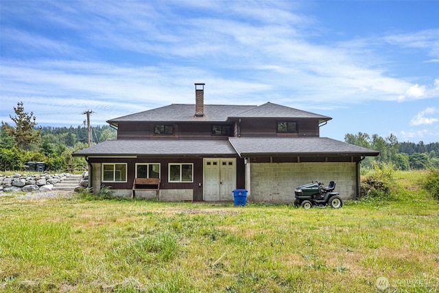 13402 Spring Site Rd E, Orting, WA 98360 - rear view of house with a chimney and a shingled roof