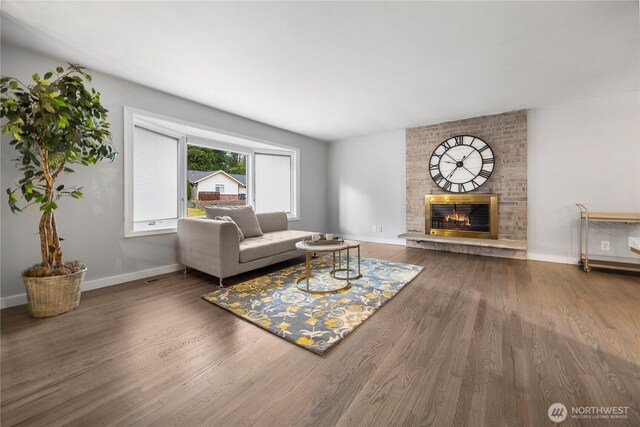 11335 NE 149th St, Kirkland, WA 98034 - living room with wood finished floors and a brick fireplace