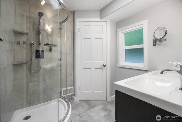 11335 NE 149th St, Kirkland, WA 98034 - full bathroom featuring a shower stall, tile patterned floors, and vanity