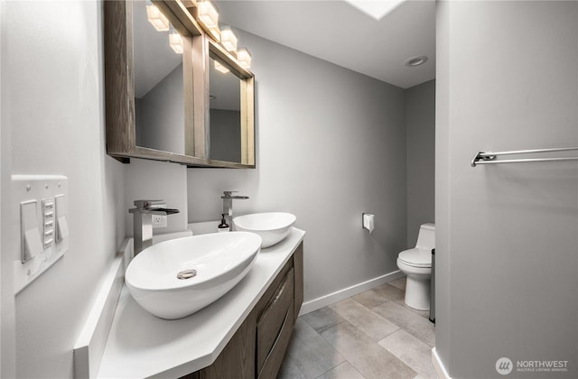 11335 NE 149th St, Kirkland, WA 98034 - bathroom featuring double vanity and tile patterned flooring