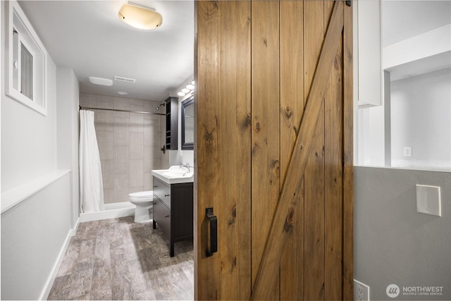 11335 NE 149th St, Kirkland, WA 98034 - full bath with vanity, a tile shower, and wood finished floors