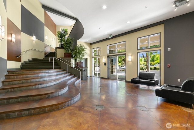 225 Logan Ave S Unit B355, Renton, WA 98057 - community lobby featuring stairs, a high ceiling, and recessed lighting