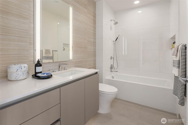 2510 6th Ave Unit 3605, Seattle, WA 98121 - bathroom featuring vanity, shower / bathtub combination, tile patterned flooring, decorative backsplash, and tile walls