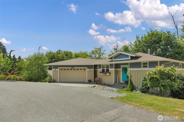 17356 Red Hawk Ct, Mount Vernon, WA 98274 - view of front of property featuring an attached garage, asphalt driveway, and a front lawn