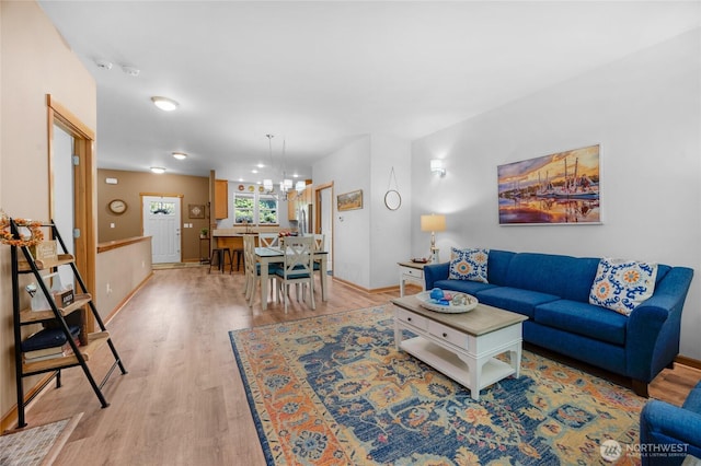 17356 Red Hawk Ct, Mount Vernon, WA 98274 - living room featuring a chandelier and light wood-style flooring