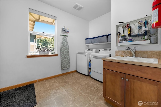 17356 Red Hawk Ct, Mount Vernon, WA 98274 - laundry room featuring washer and clothes dryer and a sink