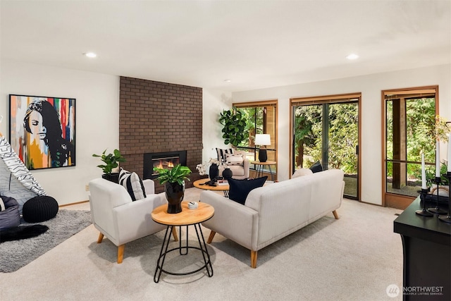 6160 W Mercer Way, Mercer Island, WA 98040 - living room featuring a fireplace, light colored carpet, and recessed lighting
