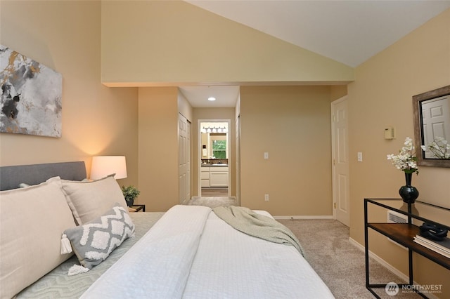 2001 120th Pl SE Unit 7-101, Everett, WA 98208 - bedroom with carpet floors, lofted ceiling, and ensuite bath
