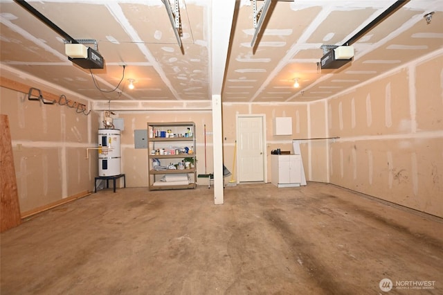 2001 120th Pl SE Unit 7-101, Everett, WA 98208 - garage with a garage door opener and secured water heater
