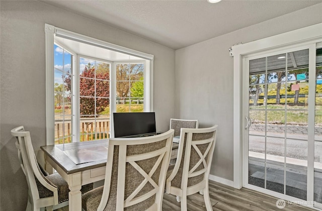 2440 Rock Island Rd, East Wenatchee, WA 98802 - dining space featuring wood finished floors and baseboards