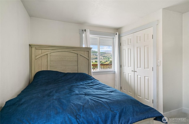 2440 Rock Island Rd, East Wenatchee, WA 98802 - bedroom with a closet and baseboards