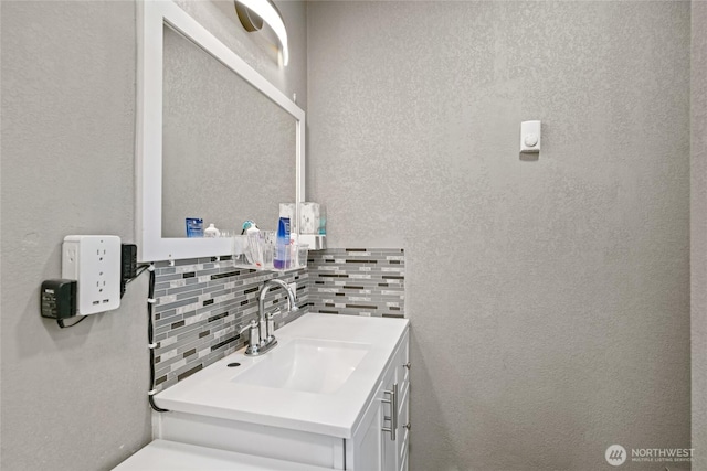 2440 Rock Island Rd, East Wenatchee, WA 98802 - bathroom featuring backsplash and vanity